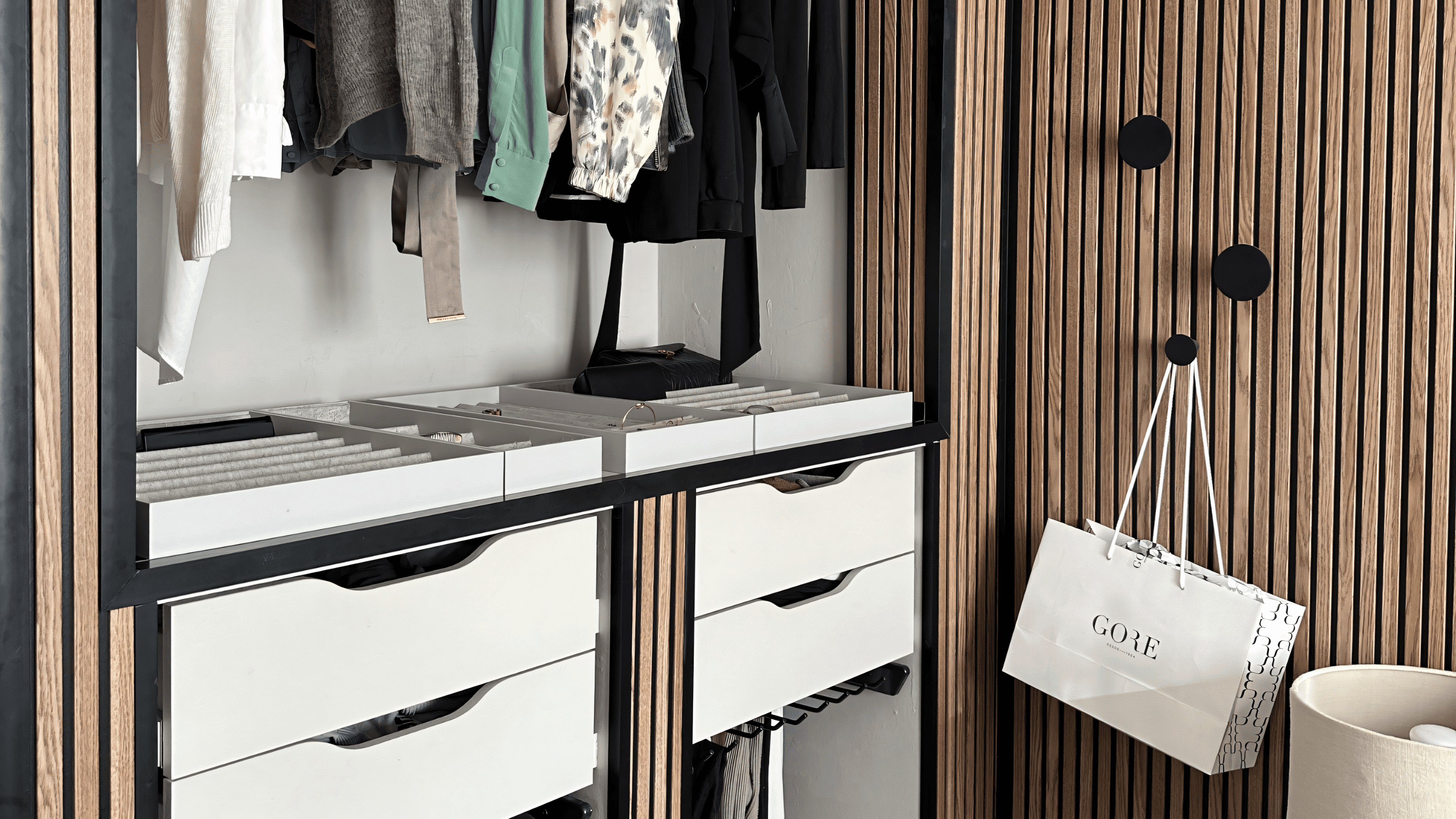 Open wardrobe with oak slats, white drawers and jewellery tray
