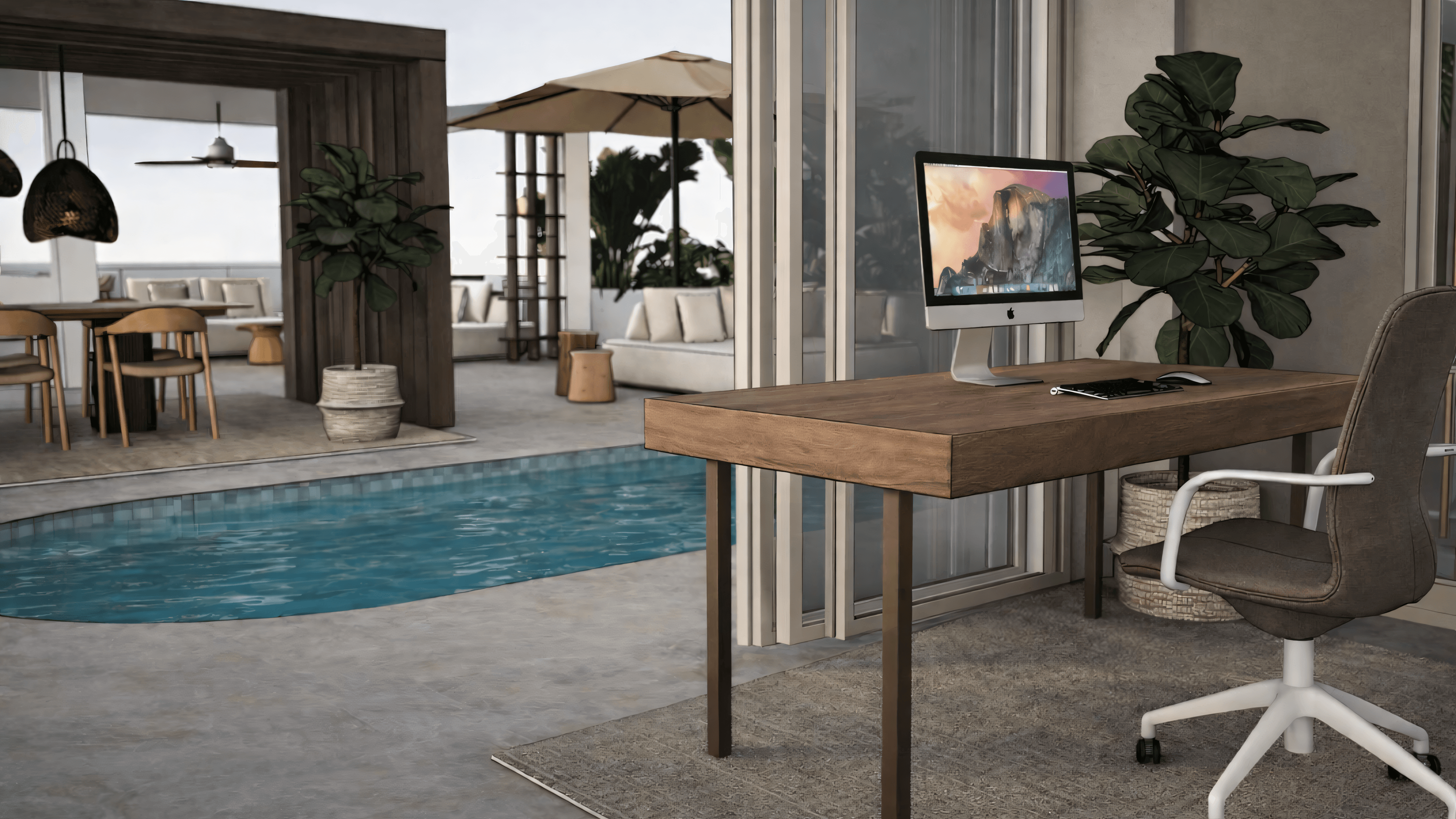 Desk with pool view, fiddle-leaf fig and outdoor lounge in the background